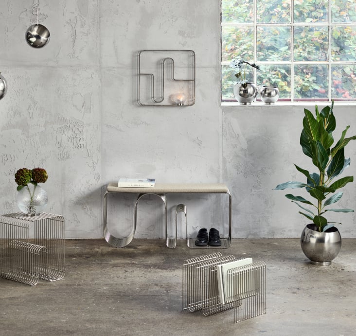 A minimalist interior styled with AYTM furniture and accessories in neutral tones and clean Scandinavian lines