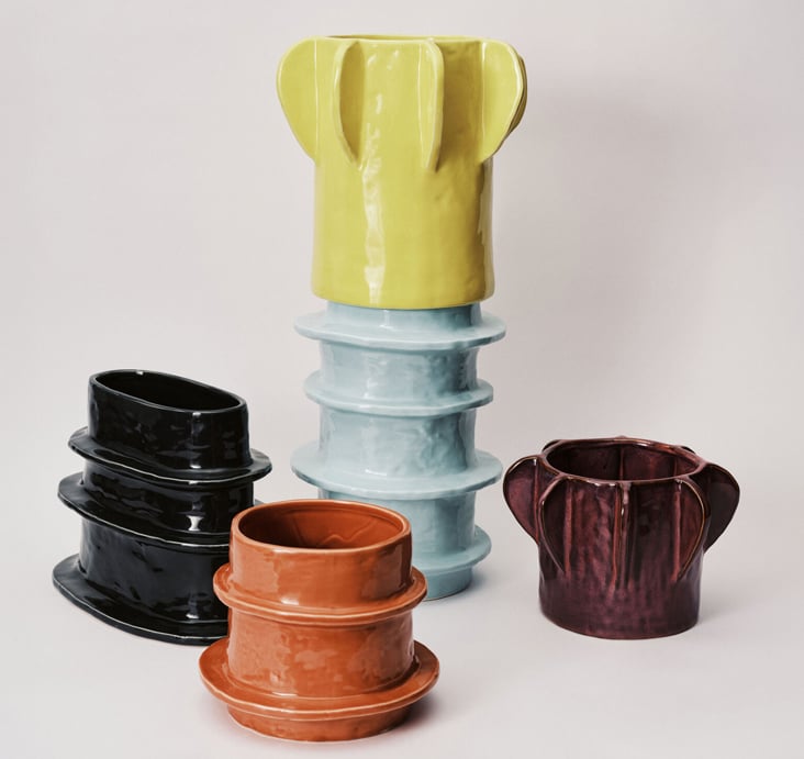 Serax 'Molly' ceramic vases in yellow, black and terracotta with a ribbed, faceted shape